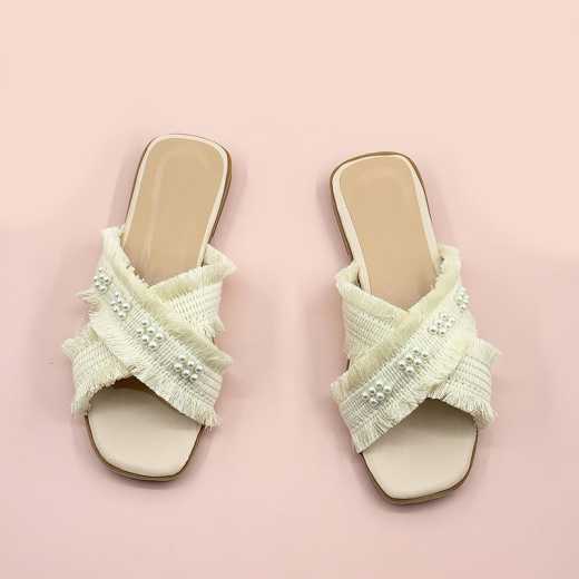 Fringed beaded slippers with crossed open toes and comfortable flat bottom slippers are stylish and versatile